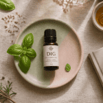 huile essentielle DIG bienfaits sur table avec plantes